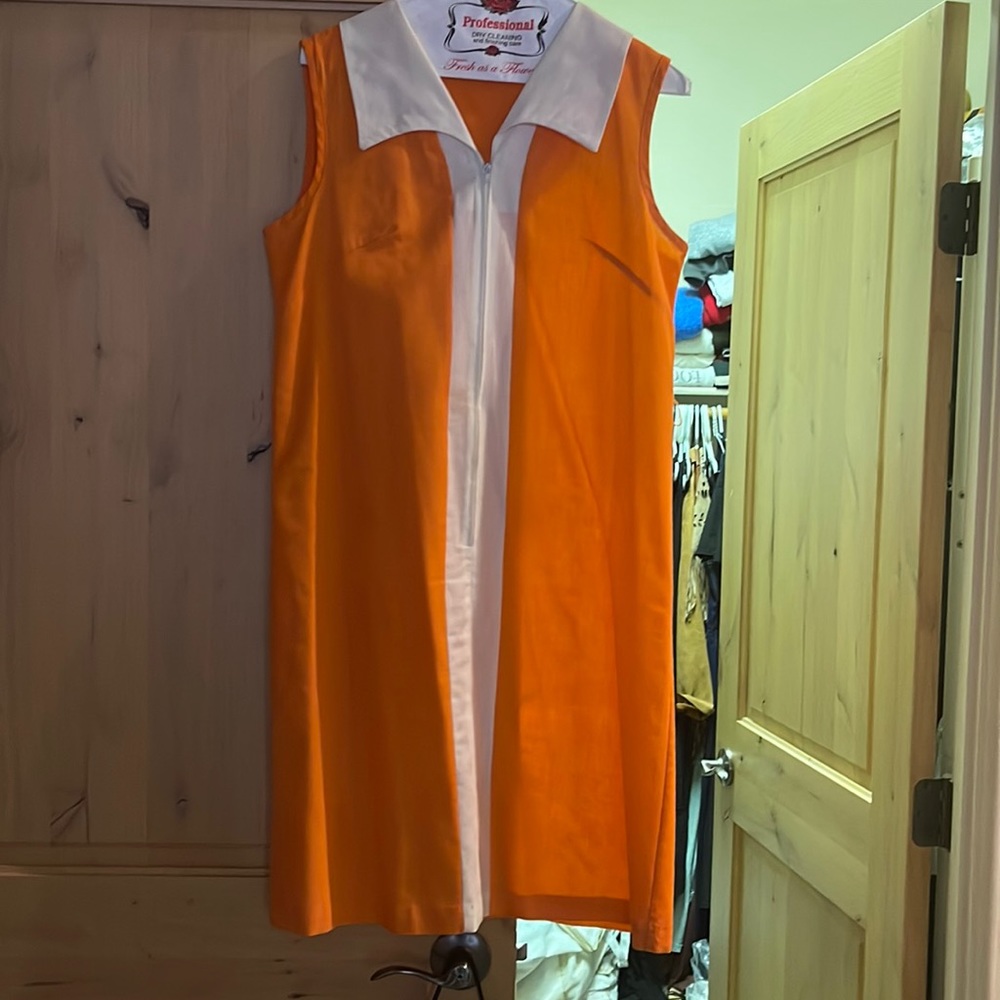 Cute little orange and White cotton dress.